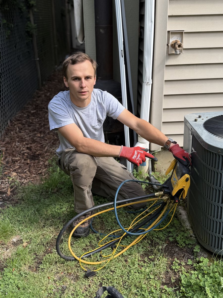 Andrew Naroyskiy servicing an HVAC system in Clark County, WA
